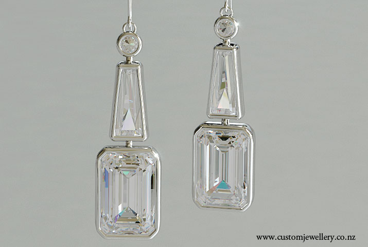 Contemporary Emerald Cut Bezel Set Diamond Earrings
