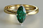 yellow 18kt gold, marquise emerald, solitaire engagement ring, white gold setting