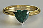 yellow 18kt gold, knife edge ring, heart cut emerald, emerald solitaire, engagement ring