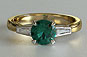 Yellow Gold Vintage Style Round Emerald and Baguette Side Stones Engagement Ring
