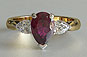three-stone engagement ring, nz, pear cut, ruby