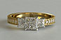Yellow Gold Princess Cut Engagement Ring 3-stone With Princess Side Stones