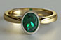 Oval Emerald Solitaire Engagement Ring Yellow Gold Rubover