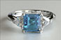 Square Emerald Aquamarine and Trillion Three-stone Engagement Ring