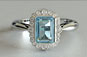 Vintage Emerald Aquamarine and Round Cut Diamond Engagement Ring