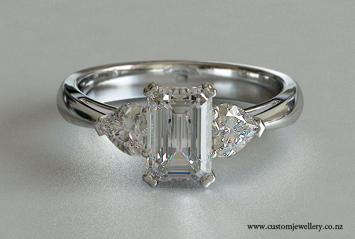 Three-stone Emerald and Heart Cut Diamond Engagement Ring