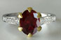 Oval Cut Ruby 1.5ct Two Tone Engagement Ring
